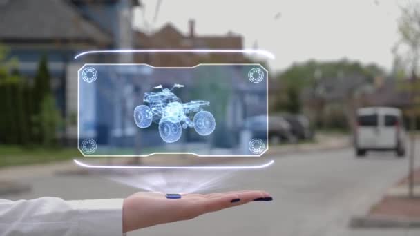 Female hand showing hologram quad bike — Stock Video