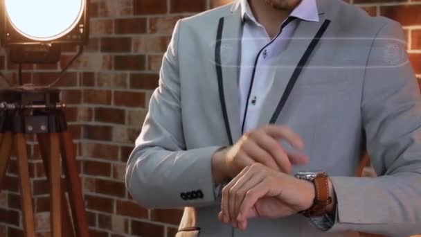 Man uses smartwatch hologram Target Customer — Stock Video