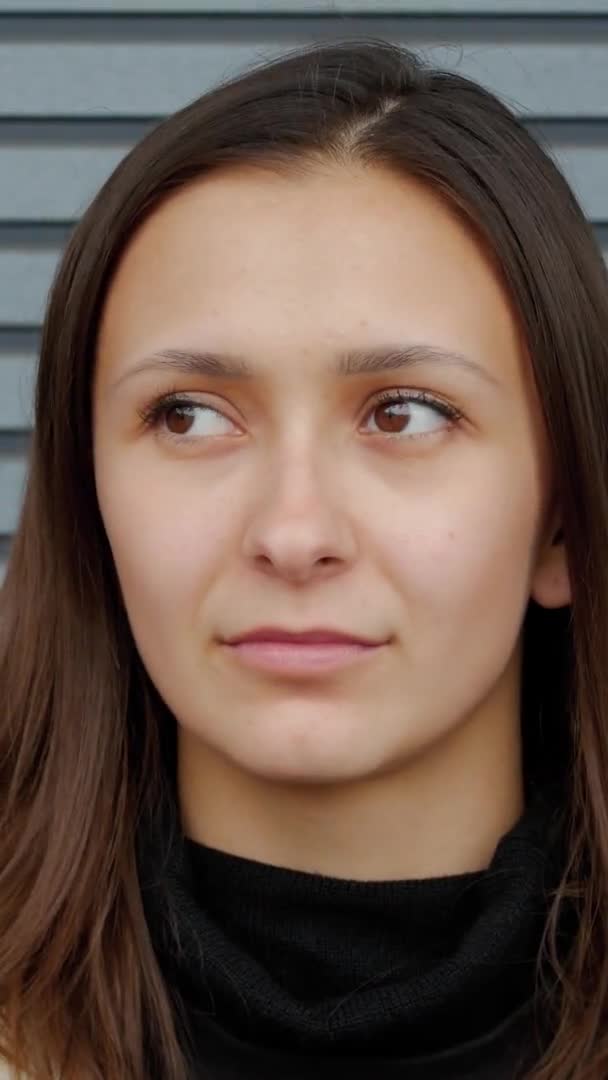 Vertical video of Business woman shyly smiling close-up — Stock Video