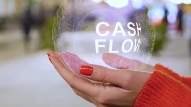 Female hands holding text Cash Flow — Stockvideo