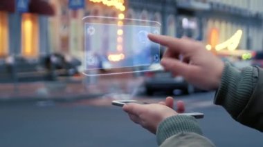 Kadın elleri HUD hologram API ile etkileşim içinde