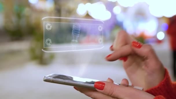 Mãos femininas interagem HUD holograma lâmpada de descarga de gás — Vídeo de Stock