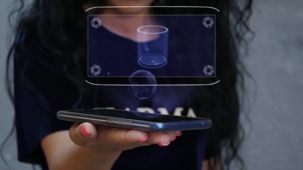 Woman showing HUD hologram mug — Stock Video