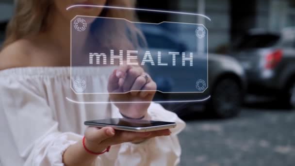 Rubia interactúa HUD holograma mHEALTH — Vídeos de Stock