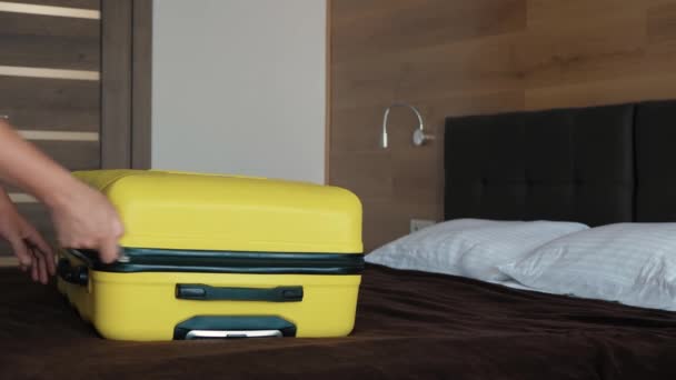 Hands yellow suitcase — Stock Video