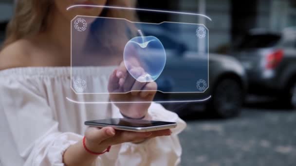 Loira interage HUD holograma maçã — Vídeo de Stock