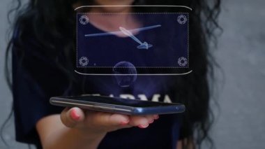 HUD hologram uçak gösteren kadın