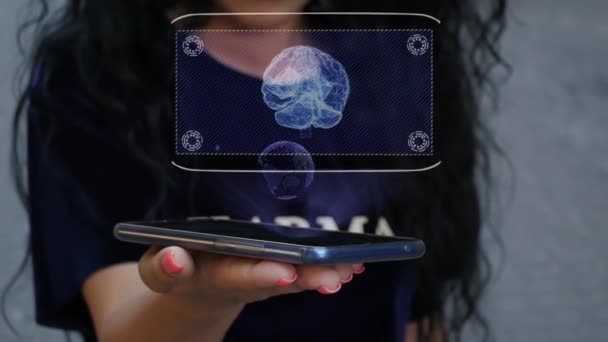 Frau zeigt HUD-Hologramm menschliches Gehirn — Stockvideo