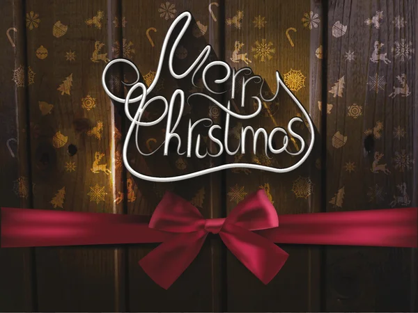 Hand getekend vrolijk kerstfeest op de houten achtergrond met satijnen lint — Stockvector