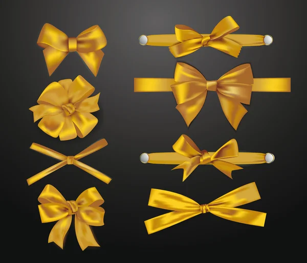 Set of elegant gold silk bows — Stock Vector