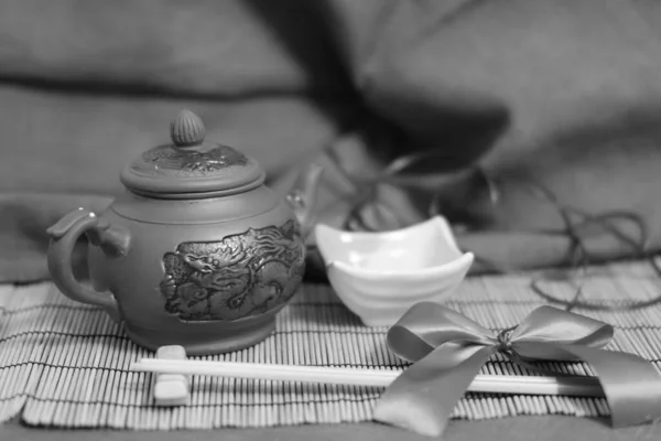 ceramic teapot for tea on a tray