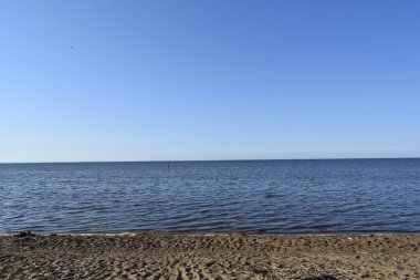 Deniz kıyısında gün batımı