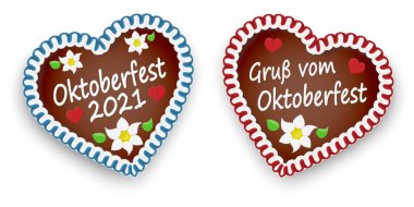Oktoberfest 2021 tarihi için Ekim Festivali 'nden (Almanca) gelen mesajlarla zencefilli kek kalbini resmediyordu.