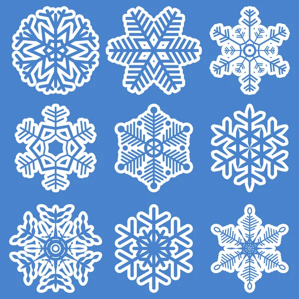 Colección de diferentes copos de nieve blancos — Archivo Imágenes Vectoriales