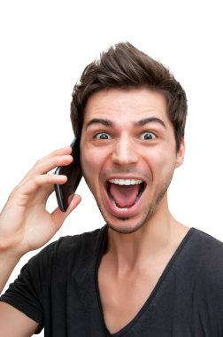 Genç adam telefon tarafından heyecan.