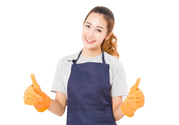 Mujer asiática sonriente usando guantes de goma abandonando pulgares . — Foto de Stock