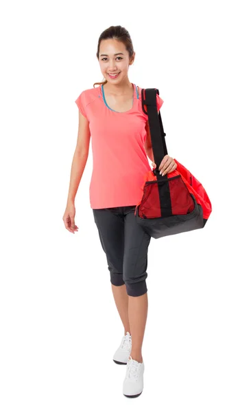 Asian Smiling fit young woman with gym bag standing ready for fitness exercise Isolated on white background. — Stock Photo, Image