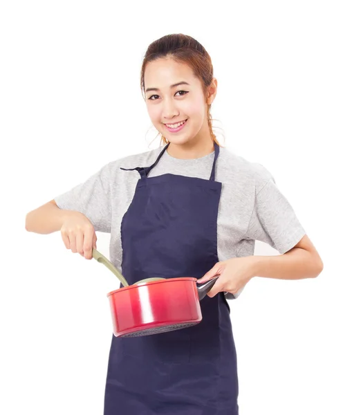 Asian Woman Wearing Apron And Showing Pot With Utensil — Stock Photo, Image