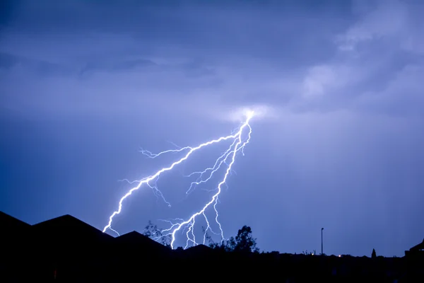 Cloud to Ground forked Lightning Strike Stock Image