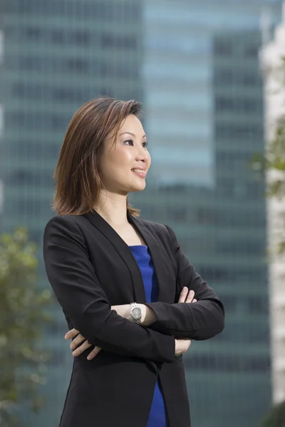 Chinese businesswoman looking away