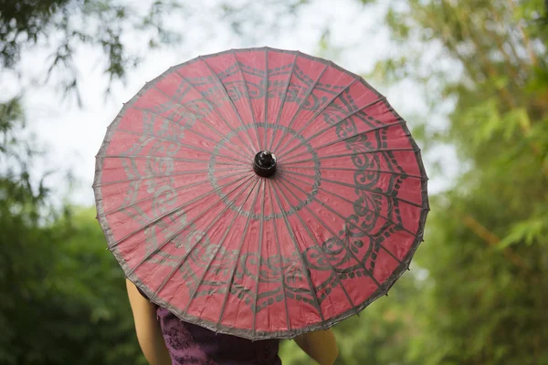 Chinese Woman with traditional umbrella