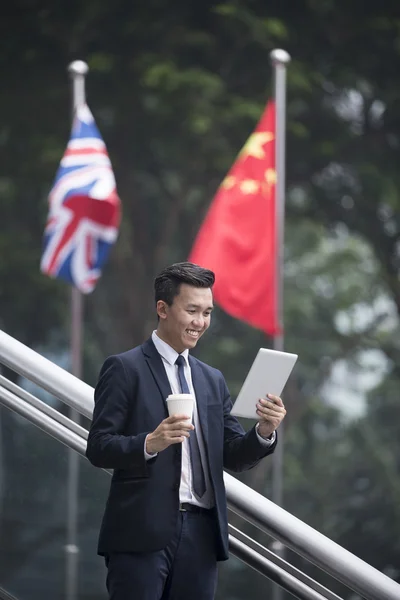 Chinese businessman with a tablet