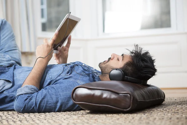 Asian Man using Tablet PC.