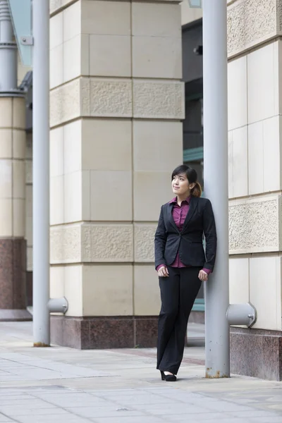 Chinese businesswoman in modern city