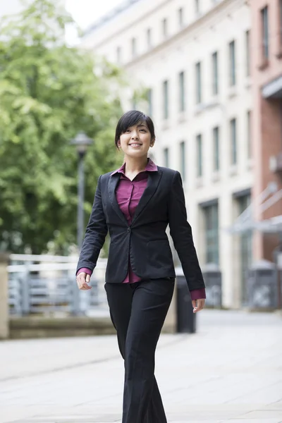 Chinese businesswoman in modern city