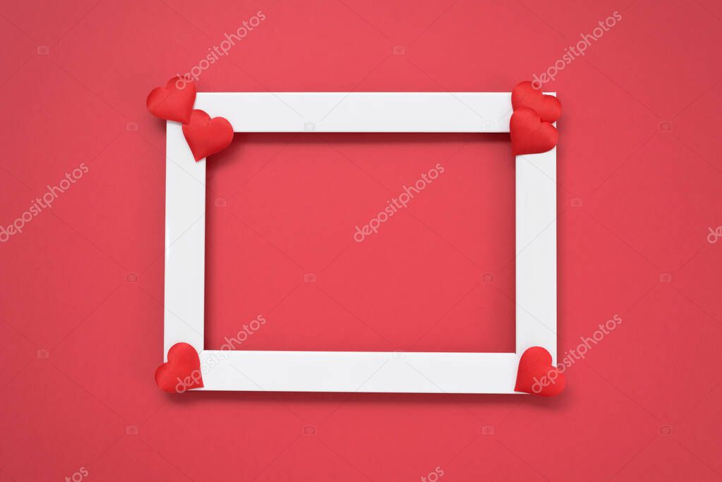 blank greeting card with place for text Valentine's day gift with red ribbon and hearts on a red background. mockup.