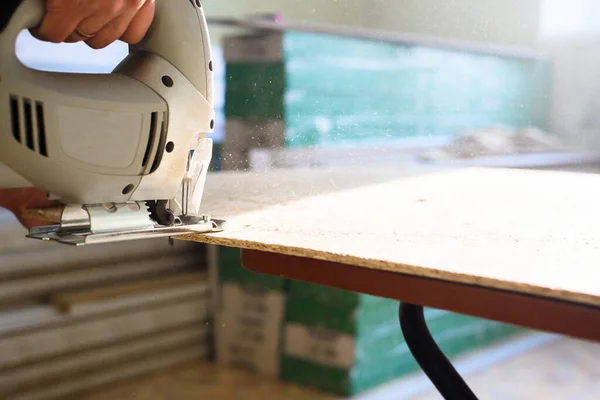 Process Sawing Plywood Electric Jigsaw Man Holds Tool His Hand — Stock Photo, Image