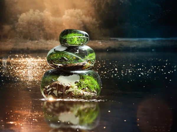 Transparent stones in water Zen pyramid