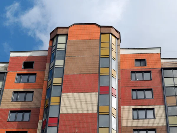 New house, new building. Bright, multi-colored blocks walls, new windows - background, texture