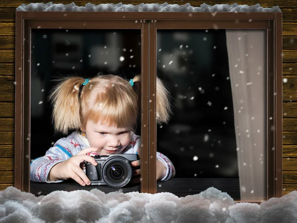 Outside the window, in the house of a little girl photographed by the camera