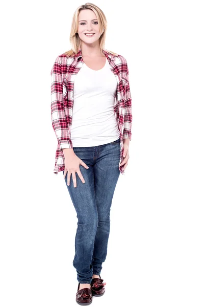 Fashionable young woman in checkered shirt — Stock Photo, Image