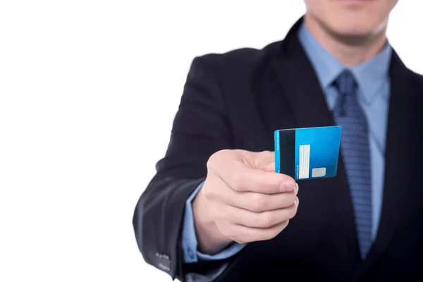 Businessman giving credit card. — Stock Photo, Image