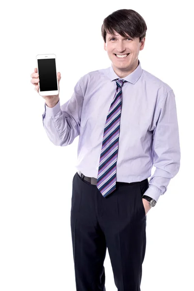 Businessman holding a mobile phone — Stock Photo, Image