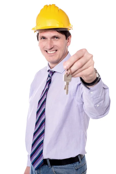Architect holding house keys Stock Picture