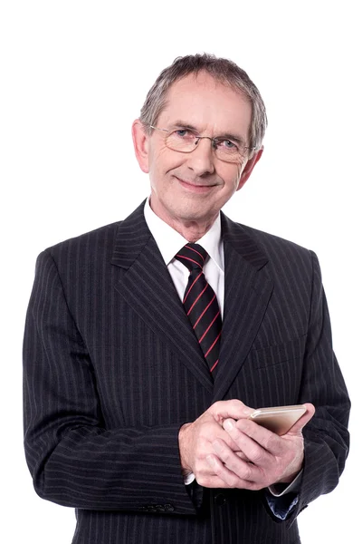 Businessperson messaging from his cellphone — Stock Photo, Image