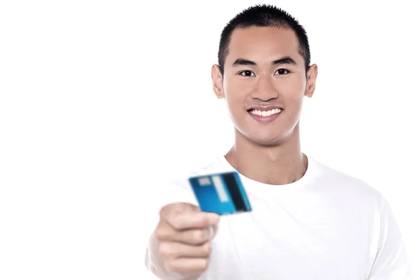 Man displaying his debit card — Stock Photo, Image