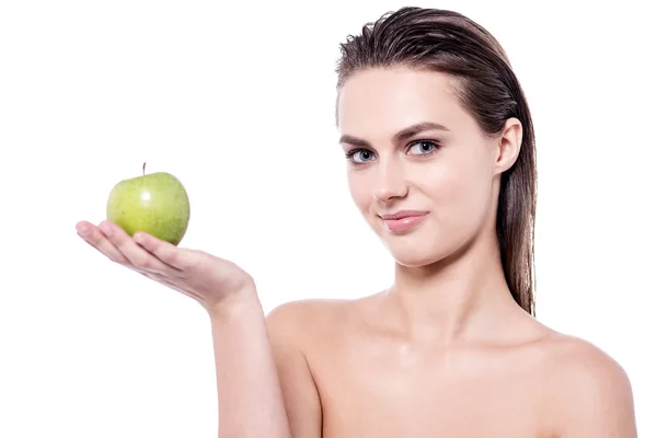 Jeune femme avec une pomme à la main — Photo