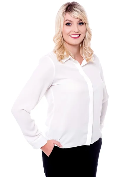 Business woman posing with hands in pockets — Stock Photo, Image
