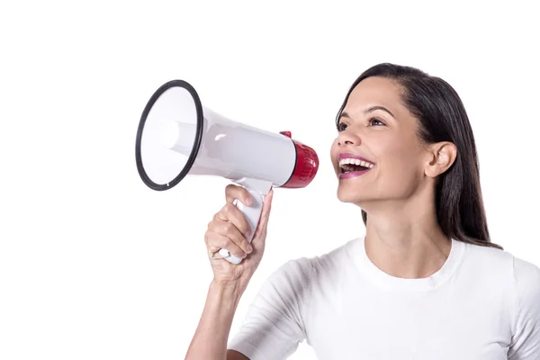Woman yelling into a megaphone — Stock Photo, Image