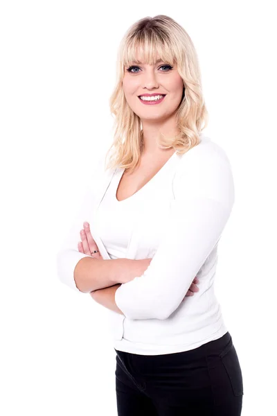 Young woman posing with folded arm — Stock Photo, Image