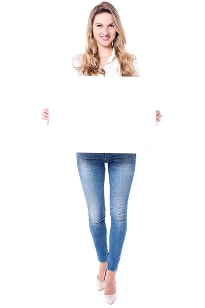 Woman holding white ad board — Stock Photo, Image