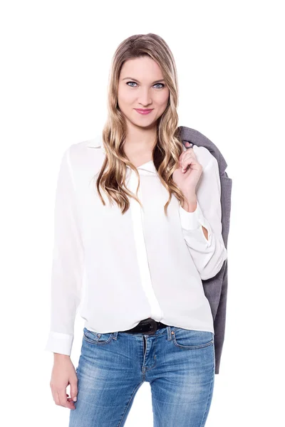 Stylish woman with jacket over shoulder — Stock Photo, Image