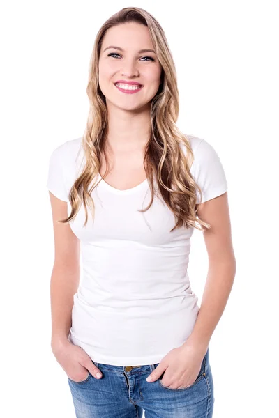 Young woman with hands in pockets — Stock Photo, Image