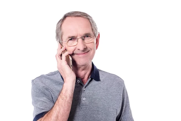Senior férfi mobiltelefonon beszél — Stock Fotó