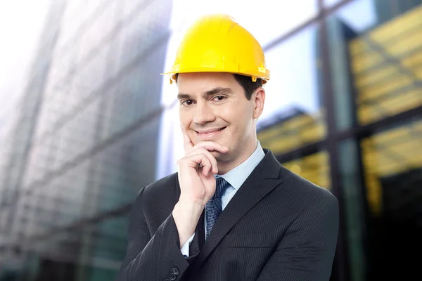 Young male architect in yellow helmet — Stock Photo, Image