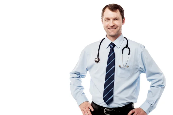 Happy male doctor hold hands on hips — Stock Photo, Image